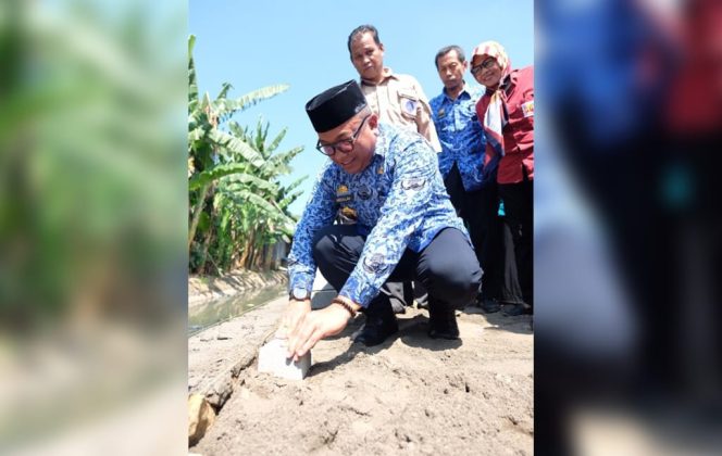 					Peletakan batu pertama program KotaKu di Kelurahan Romangpolong, Kabupaten Gowa