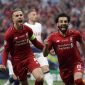 Pemain Liverpool, Mohamed Salah (kanan) melakukan selebrasi usai mencetak gol ke gawang Tottenham Hotspur pada pertandingan final Liga Champions Eropa, di Wanda Metropolitano Stadiumn, Madrid, Minggu (2/6/2019). (Foto: INT)