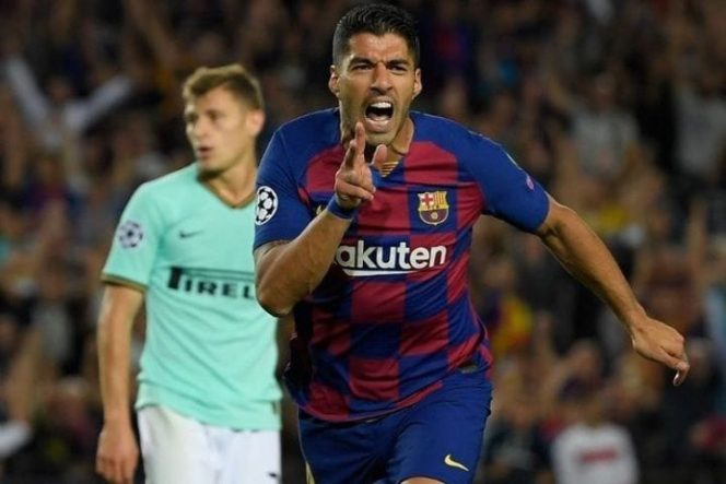 					Penyerang Barcelona Luis Suarez merayakan gol ke gawang Inter Milan untuk memastikan kemenangan dalam laga lanjutan Grup F Liga Champions di Stadion Nou Camp, Barcelona, Spanyol, Rabu (2/10/2019) setempat. (net)