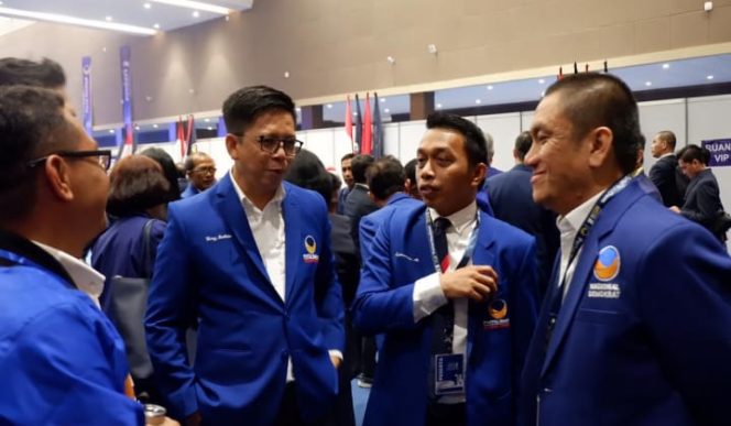 					Tommy Satria Yulianto (Kedua dari Kiri) saat menghadiri kongres partai NasDem di Jakarta. (BERITA.NEWS/IL). 
