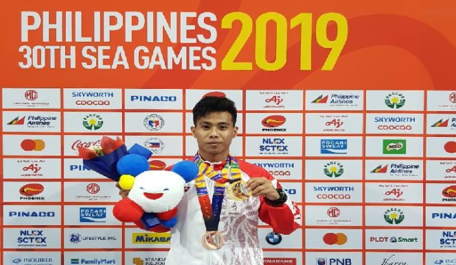 					Andi Try Sandi Saputra peraih medali emas cabang Takraw di Sea Games 2019 di Filipina. 
