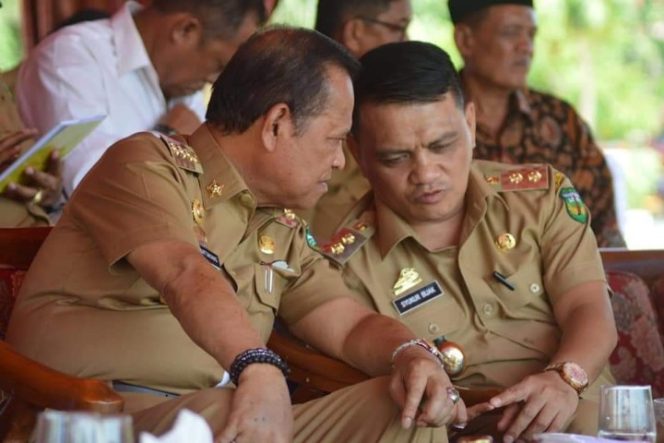 					Bupati Luwu Basmin Mattayang dan Wabup Luwu Syukur Bijak.