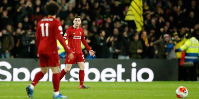 					Reaksi Mohamed Salah dan Andrew Robertson ketika Liverpool kebobolan tiga gol di Vicarage Road, kandang Watford. (AP Photo)