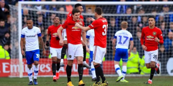 					Kapten Manchester United, Harry Maguire merayakan gol ke gawang Tranmere (AP Photo)
