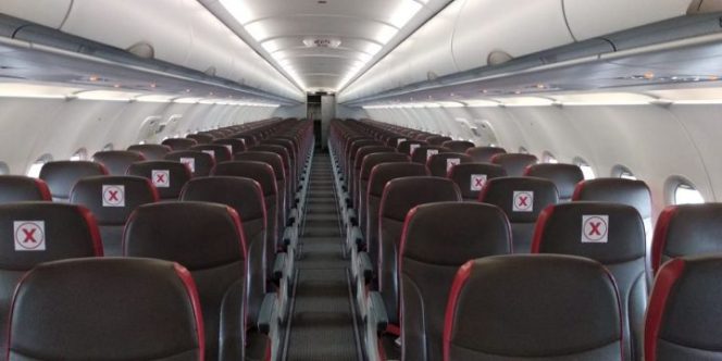 					Tempat duduk berjarak di Lion AirTempat duduk berjarak di Lion Air (Foto: Lion Air)