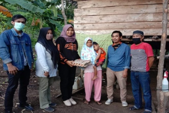 					Pemuda Pancasila Luwu dan Wartawan Ikut Berbagi di Desa Tallang Bulawang