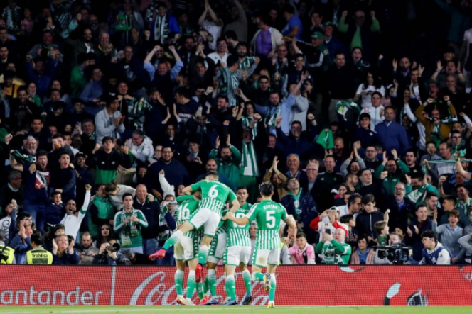 					Foto ilustrasi: Pemain Real Betis merayakan gol ke gawang Real Madrid pada laga La Liga di Estadio Benito Villamarin, Seville, Spanyol, Minggu (8/3/2020). Real Madrid dikalahkan Real Betis dengan skor 1-2. ANTARA FOTO/REUTERS/Marcelo Del Pozo/aww.