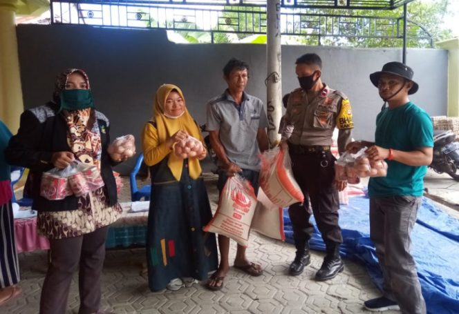 					Penyaluran BSP Sembako program BPNT di kawal personel Polres Jeneponto. (ist). 