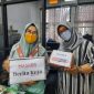 Sejumlah jurnalis Gowa yang memberikan bantuan masker untuk masyarakat gowa. (Foto: berita.news/Putri).