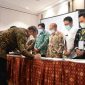 Rapat Koordinasi DPM-PTSP kabupaten/kota se Sulawesi Selatan sekaligus Pendatanganan MoU antara Gubernur dangan para bupati/walikota. (Foto: berita.news/Putri)