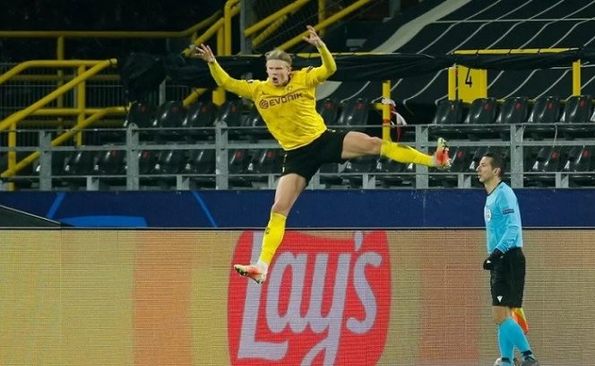 					Penyerang Borussia Dortmund Erling Haaland merayakan gol keduanya ke gawang Sevilla dalam leg kedua 16 besar Liga Champions di Stadion Signal Iduna Park, Dortmund, Jerman, Selasa (9/3/2021) waktu setempat. ANTARA/REUTERS/POOL/Leon Kuegeler.