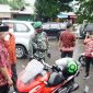 Pelaksanaan penegakan pendisiplinan protokol kesehatan di Jalan Usman Salengke. (Foto:berita.news/Putri).