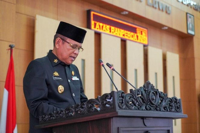 					Bupati Luwu, Dr H Basmin Mattayang.