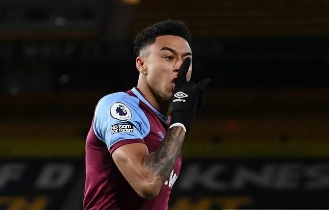 					Gelandang serang West Ham United Jesse Lingard melakukan selebrasi seusai mencetak gol ke gawang Wolverhampton dalam lanjutan Liga Inggris di Stadion Molineux, Wolverhampton, Inggris, Senin (5/4/2021). (ANTARA/REUTERS/POOL/Laurence Griffith)