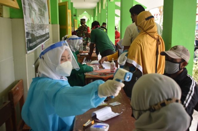 					Suasana vaksinasi yang digelar di Demak, Rabu (14/7/2021).
