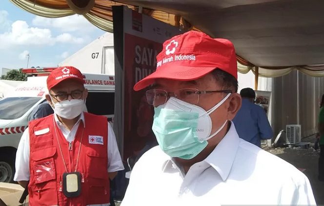 					Ketua Umum Palang Merah Indonesia (PMI) Jusuf Kalla berbicara kepada awak media di gudang markas PMI Pusat di Jakarta, Senin (12/7/2021) ANTARA/Dewa Ketut Sudiarta Wiguna/aa.