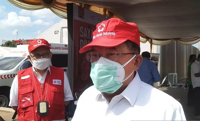 					Ketua Umum Palang Merah Indonesia (PMI) Jusuf Kalla berbicara kepada awak media di gudang markas PMI Pusat di Jakarta, Senin (12/7/2021). ANTARA/Dewa Ketut Sudiarta Wiguna/aa.