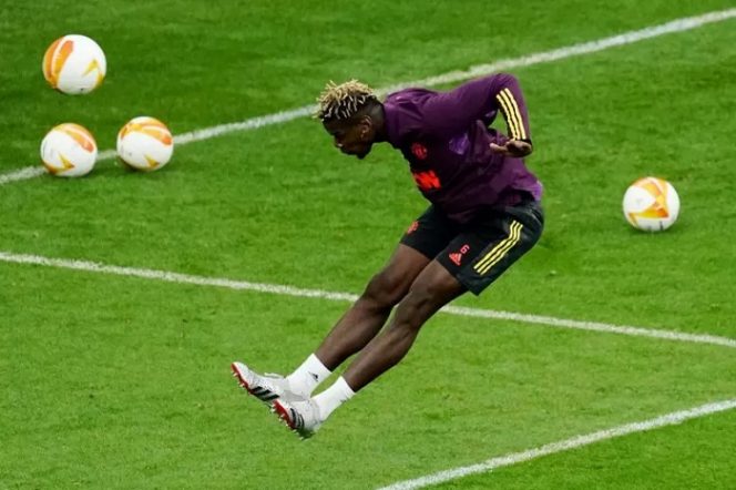 					Paul Pogba dari Manchester United selama latihan untuk Europa League, Final Manchester United Training di Stadion Energa Gdansk, Gdansk, Polandia, Selasa (25/5/2021). ANTARA FOTO/Pool via REUTERS/Aleksandra Szmigiel/AWW/sa.