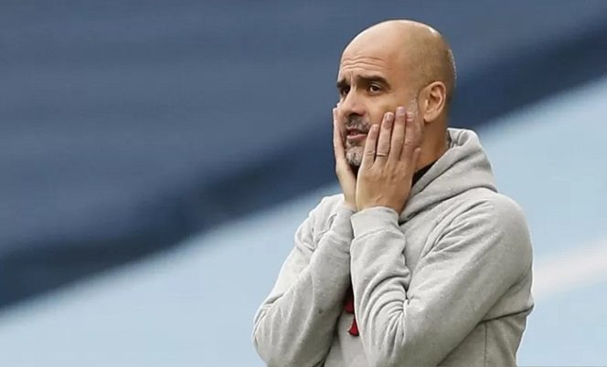					Pelatih Manchester City Pep Guardiola. ANTARA FOTO/ Pool via REUTERS/Martin Rickett/foc.