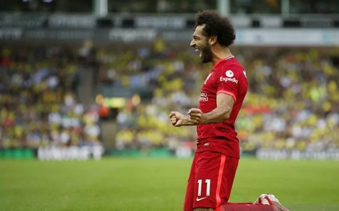 					Penyerang Liverpool Mohamed Salah merayakan golnya ke gawang Norwich City dalam laga pekan pembuka Liga Inggris 2021/22 di Stadion Carrow Road, Norwich, Inggris, Sabtu (14/8/2021) waktu setempat. (ANTARA/REUTERS/Peter Cziborra)