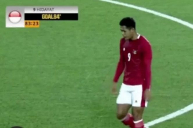 					Taufik Hidayat setelah menciptakan gol kedua untuk Indonesia pada menit ke-84 dalam laga Grup G Kualifikasi Piala Asia U-23 2022 melawan Australia di Stadion Republican Central, Tajikistan, Selasa (26/10/2021). (ANTARA/Tangkapan layar dari SCTV)