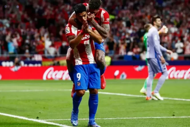					Penyerang Atletico Madrid Luis Suarez tidak melakukan selebrasi setelah mencetak gol ke gawang mantan klubnya, Barcelona dalam pertandingan La Liga di Wanda Metropolitano, Madrid, Spanyol, 3 Oktober 2021. ANTARA/REUTERS/SUSANA VERA.
