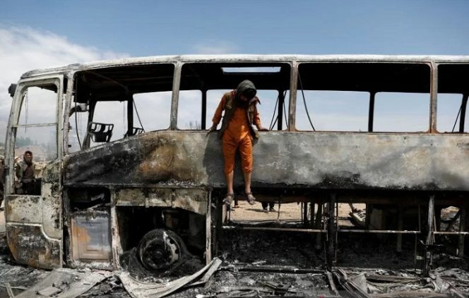 					Ilustrasi bus terbakar. REUTERS/Mohammad Ismail/foc/cfo