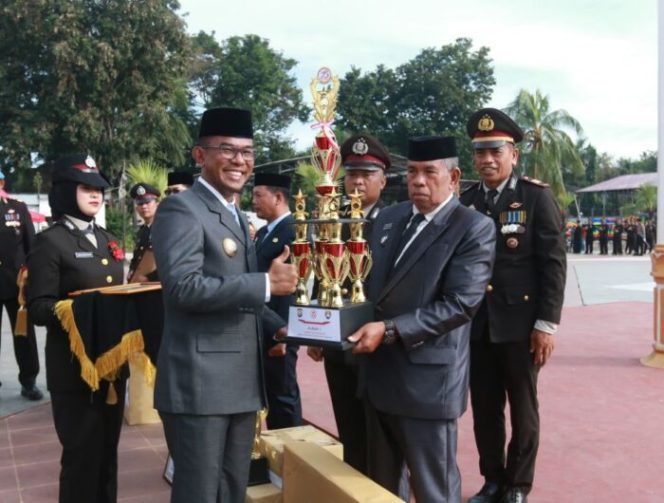 					Pj. Bupati Hadiri Upacara Peringatan HUT Bhayangkara ke-78 Tahun 2024 di Kabupaten Takalar