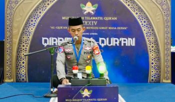 Personel Polres Bulukumba, Bripda Ahriadi Dipanggung MTQ Tingkat Provinsi. [Foto: Ist]